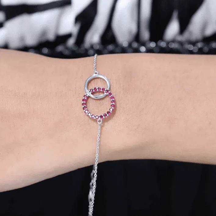 0.75 CT Round Cut Ruby Interlock Chain Eternity Bracelet in Prong Setting
