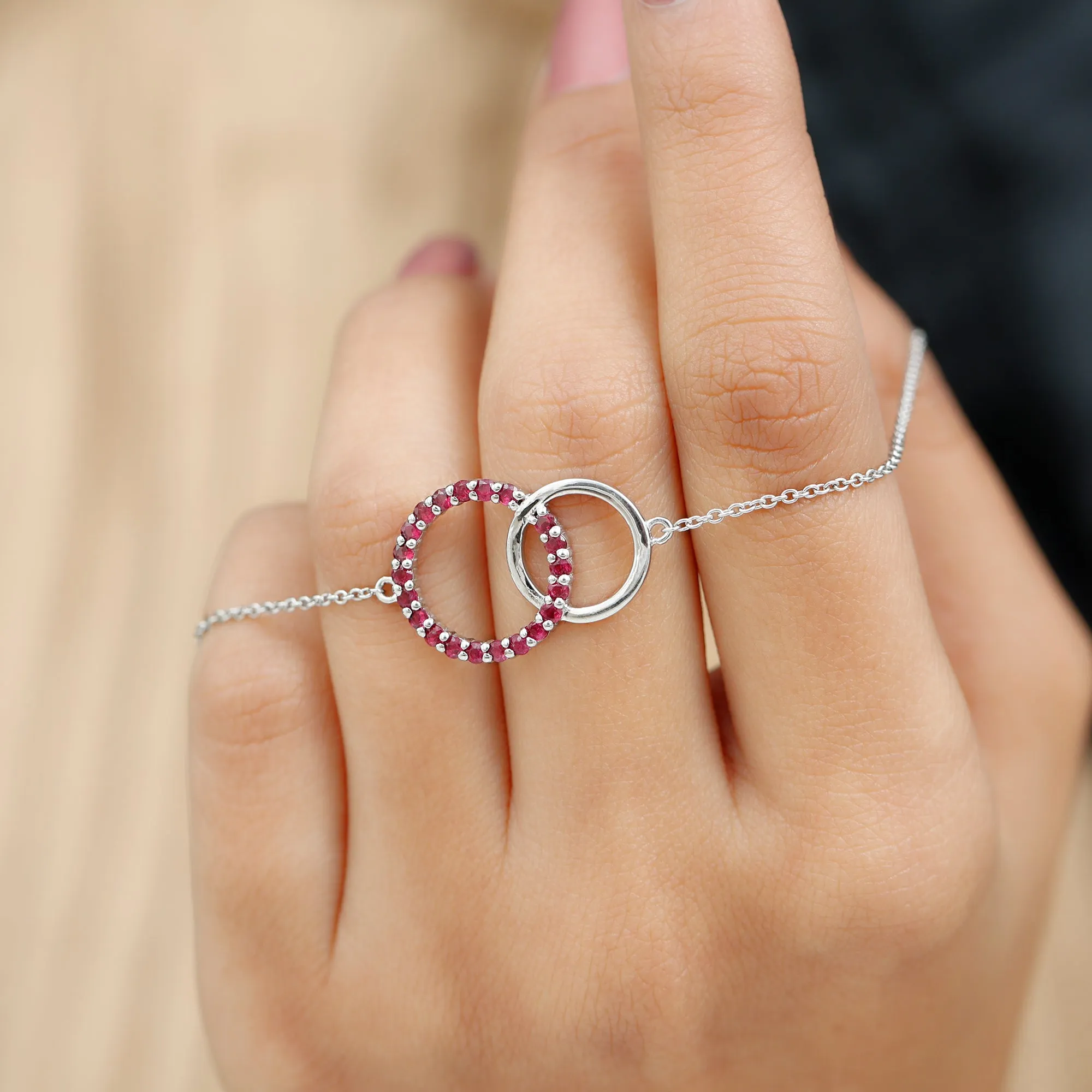 0.75 CT Round Cut Ruby Interlock Chain Eternity Bracelet in Prong Setting