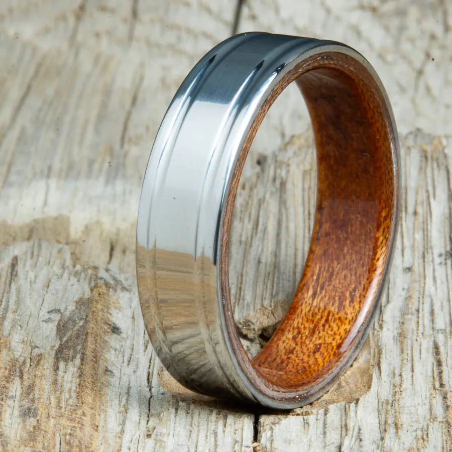 Acacia bentwood ring with polished 6mm double groove titanium