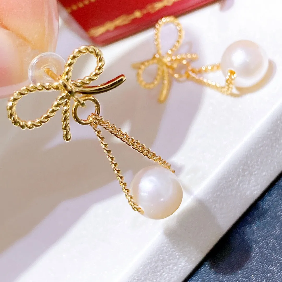 Butterfly long design natural pearl earrings
