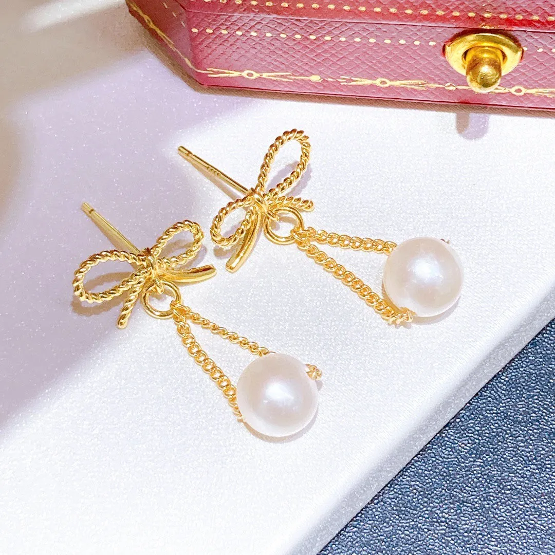 Butterfly long design natural pearl earrings