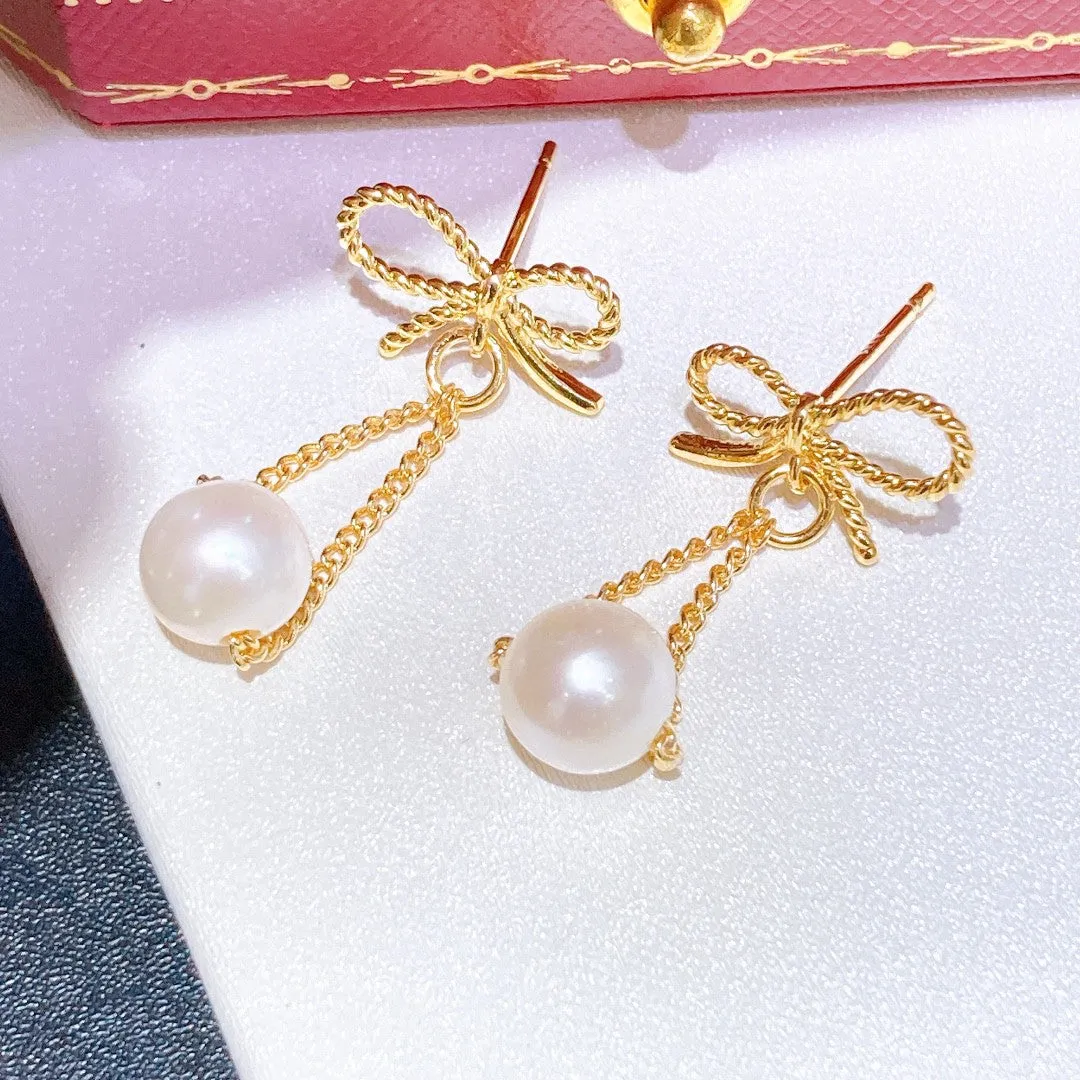 Butterfly long design natural pearl earrings