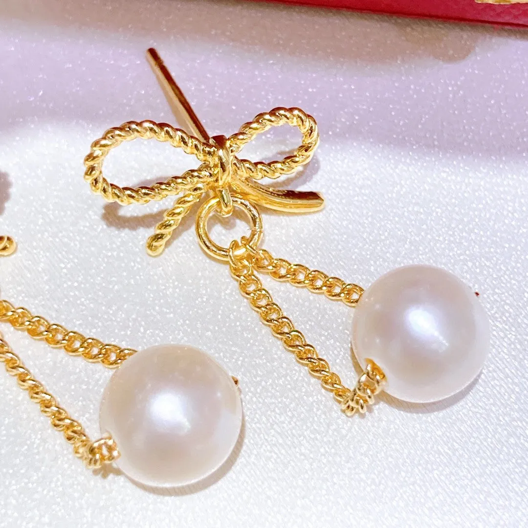 Butterfly long design natural pearl earrings
