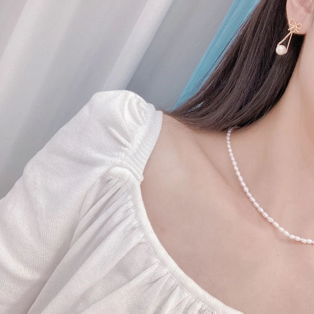 Butterfly long design natural pearl earrings