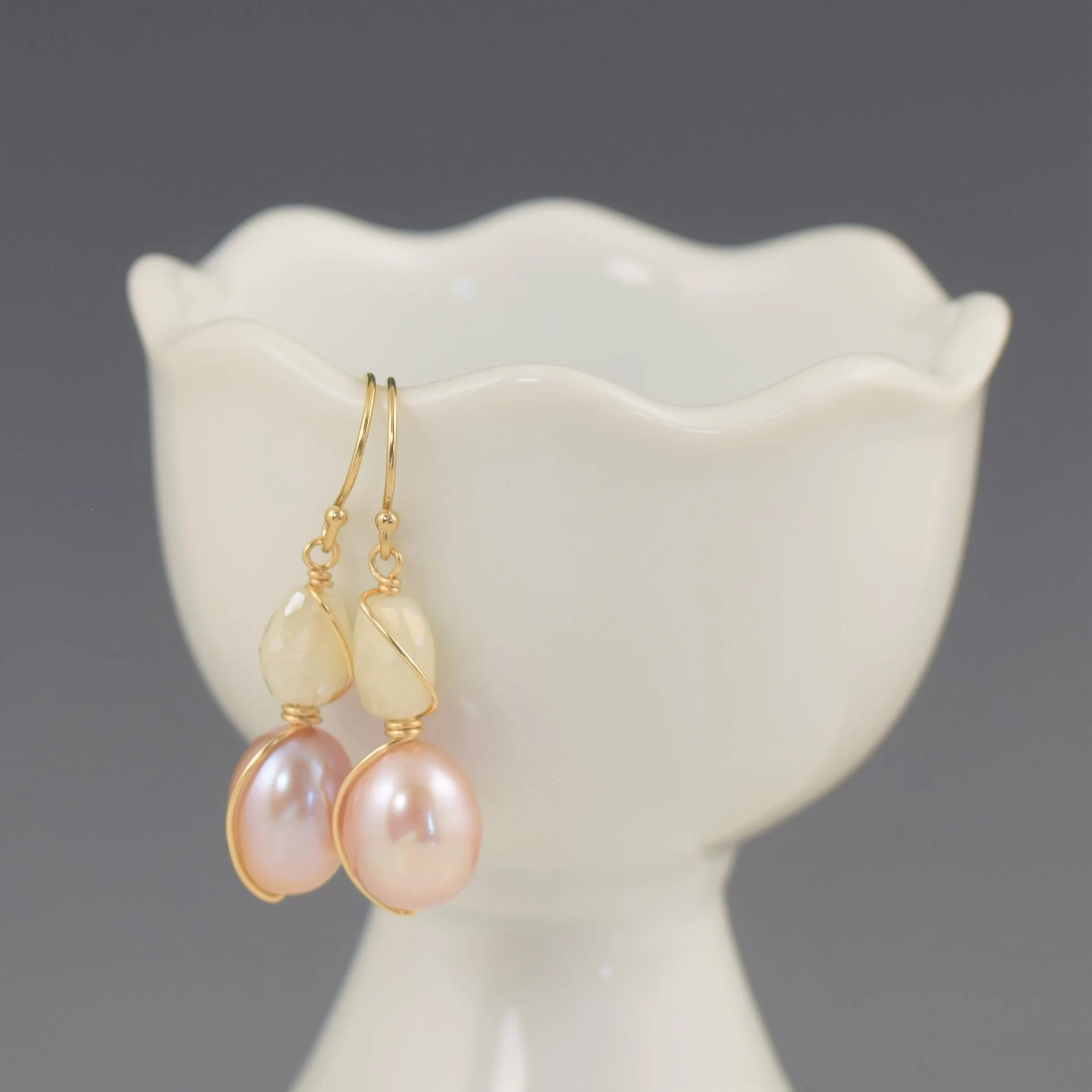 Light pink pearl earrings wire wrapped in gold filled accented by silverite gemstones