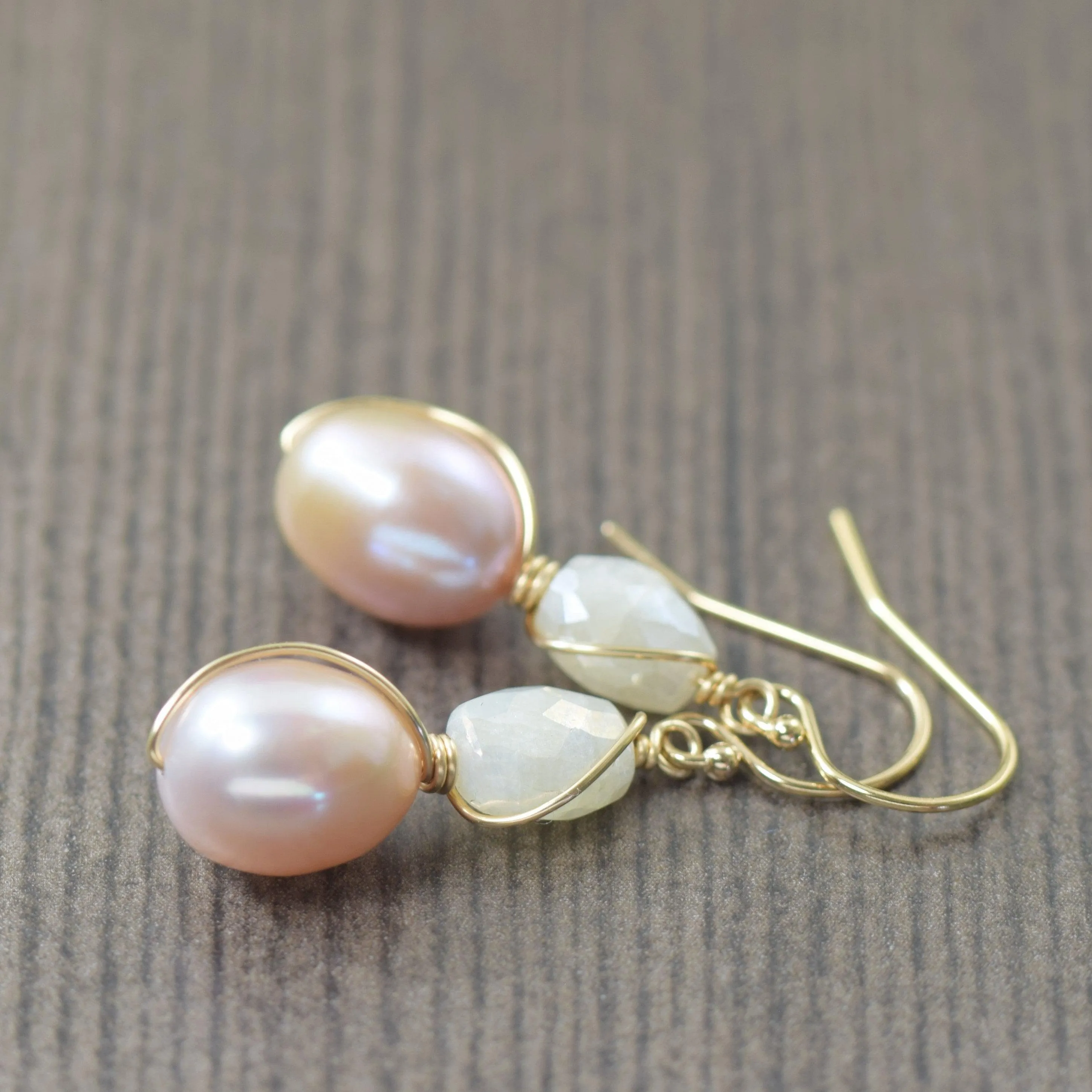 Light pink pearl earrings wire wrapped in gold filled accented by silverite gemstones
