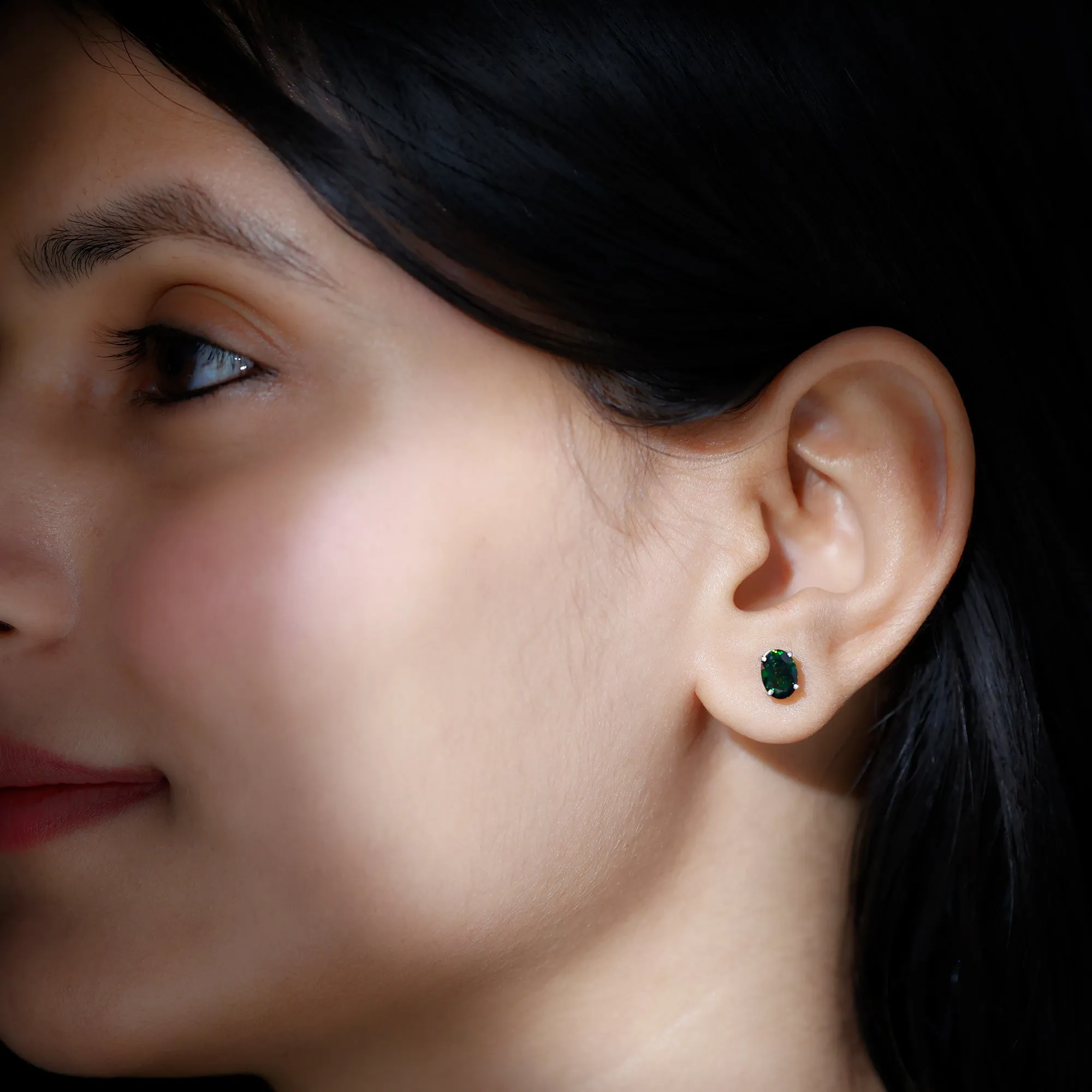 Oval Cut Black Opal Solitaire Stud Earrings in 4 Prong Setting