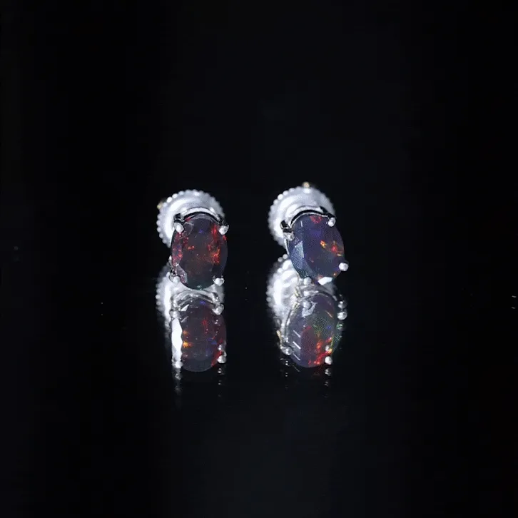 Oval Cut Black Opal Solitaire Stud Earrings in 4 Prong Setting