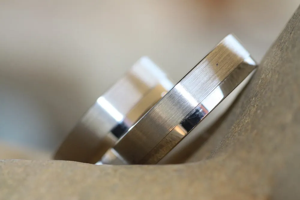 Satin and shinny Gold wedding ring with diamond