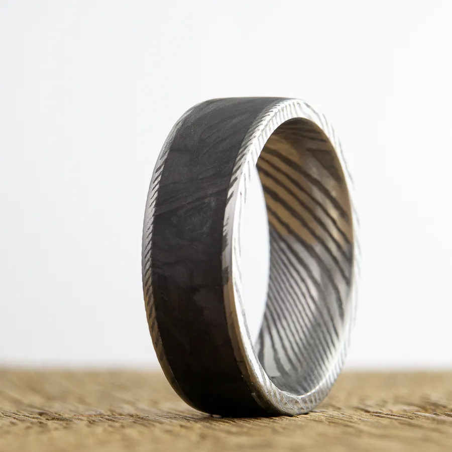 The Forged- Damascus and forged carbon fiber