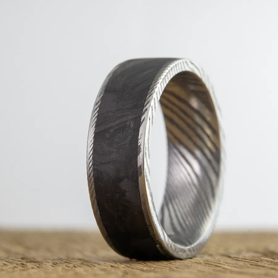 The Forged- Damascus and forged carbon fiber